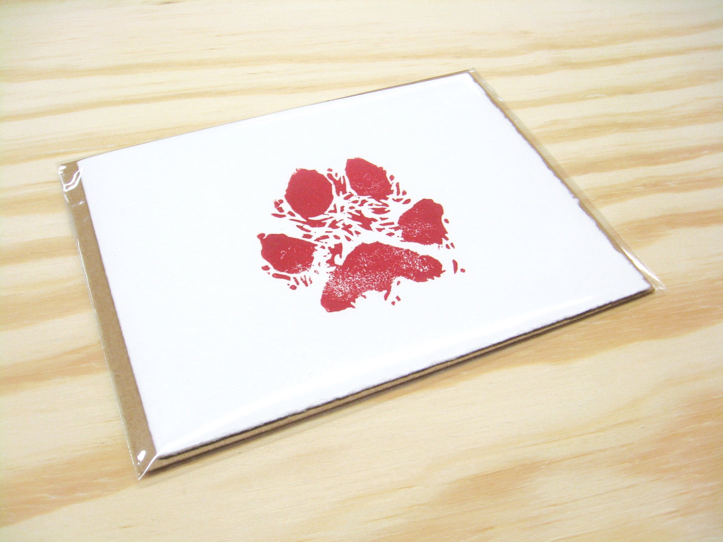 Dog Paw Bright Red single card - woodblock printed