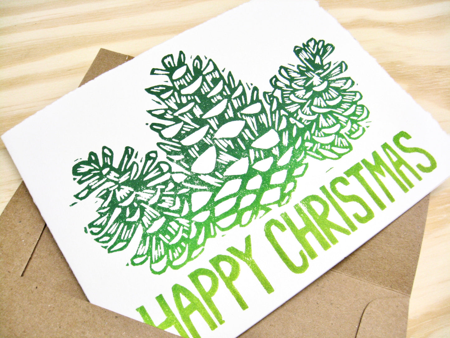 Happy Christmas Pinecones single card - woodblock printed