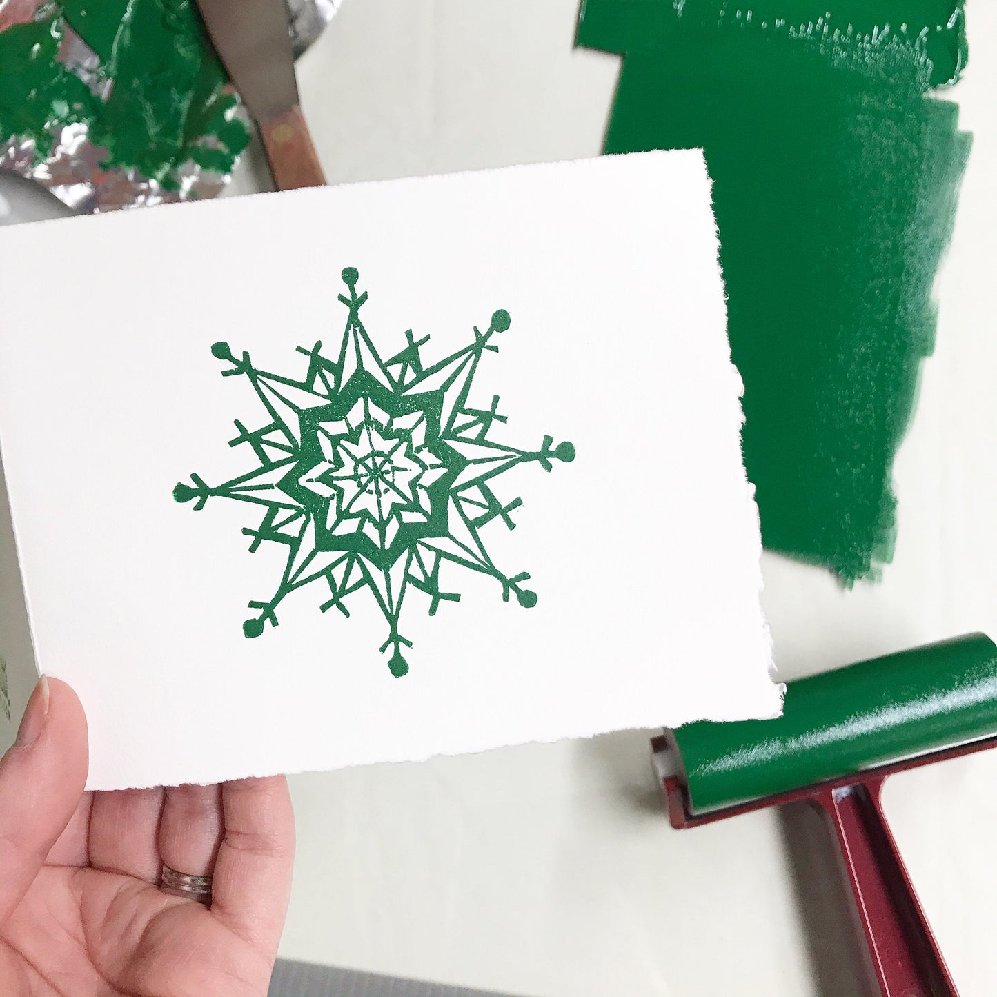 Snowflake forest green single card - woodblock printed