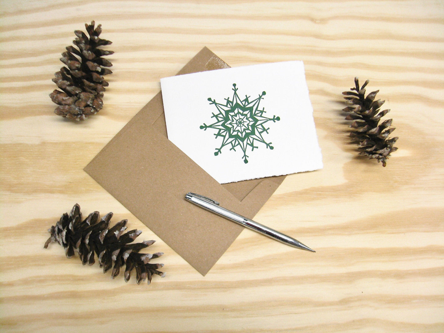 Snowflake forest green single card - woodblock printed